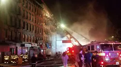 FDNY crews battle a sixth-alarm apartment building fire in Manhattan's East Village on Wednesday, Oct. 3, 2018.