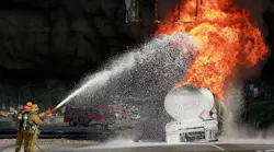 Los Angeles County firefighters put foam on a gasoline tanker which caught fire in Montebello, CA, in December 2011.