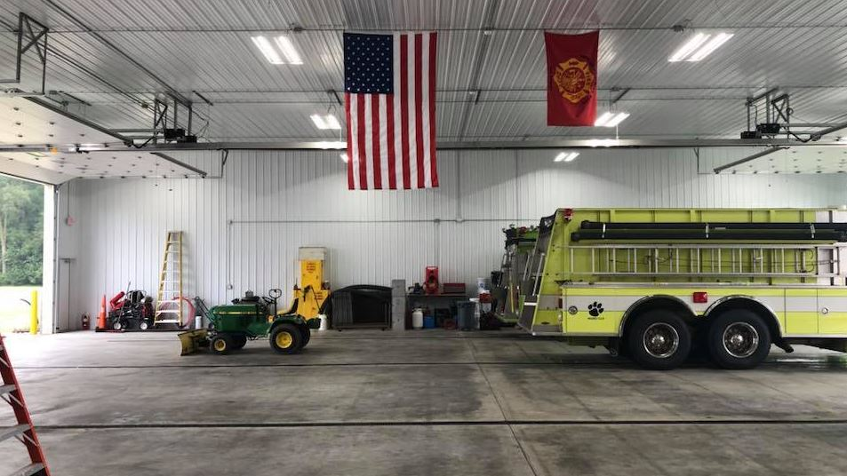 An American flag hangs inside the apparatus bay at a new $800,000 fire station in Howard Township, MI.