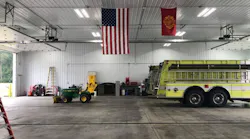 An American flag hangs inside the apparatus bay at a new $800,000 fire station in Howard Township, MI.