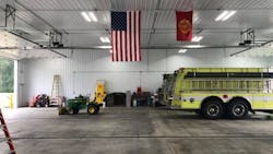 An American flag hangs inside the apparatus bay at a new $800,000 fire station in Howard Township, MI. An American flag hangs inside the apparatus bay at a new $800,000 fire station in Howard Township, MI.