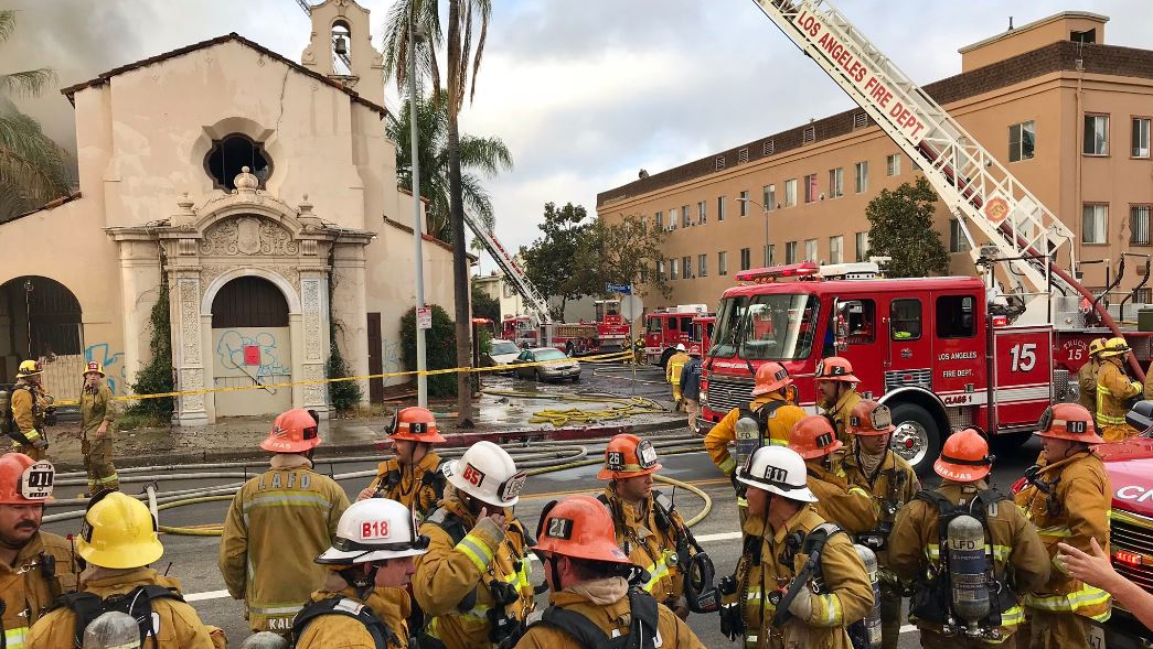 LAFD firefighters on scene during a fire at a historic Mission-style church in downtown Los Angeles on Thursday, Oct. 4, 2018.