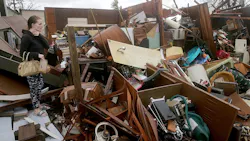 Haley Nelson inspects damage to her family properties in Panama City, FL, after Hurricane Michael made landfall along Florida's Panhandle on Wednesday, Oct. 10, 2018.