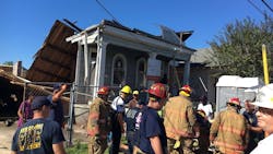 New Orleans firefighters and paramedics on scene after a home being renovated collapsed and injured eleven workers on Thursday, Oct. 11, 2018.