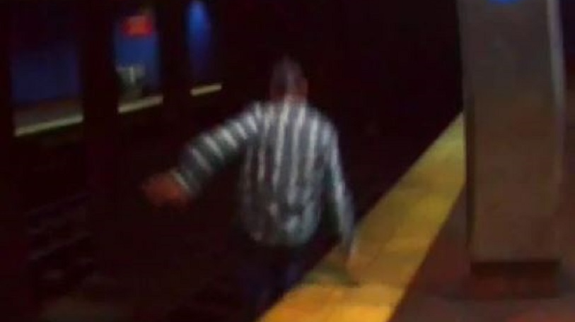 This image taken from surveillance footage in a Philadelphia SEPTA station shows a man jumping onto the tracks before running into a tunnel and attempting suicide on Thursday, Oct. 4, 2018.