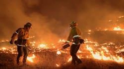 Firefighters conduct a controlled burn during efforts to contain the Boyds Fire in Ferry County, WA, in August 2018. Firefighters conduct a controlled burn during efforts to contain the Boyds Fire in Ferry County, WA, in August 2018.