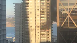 Fire burns on several floors of a San Francisco residential high-rise on Monday, Oct. 22, 2018.