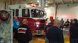 Emergency Vehicle Technicians check out a newly completed cab and chassis at Spartan Motors' plant in Charlotte, MI.