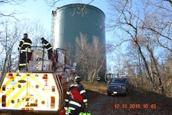 Crewmembers gather equipment to aid in the rescue. Crewmembers gather equipment to aid in the rescue.