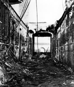 The burned out second-floor hallway where the roof had collapsed. The burned out second-floor hallway where the roof had collapsed.