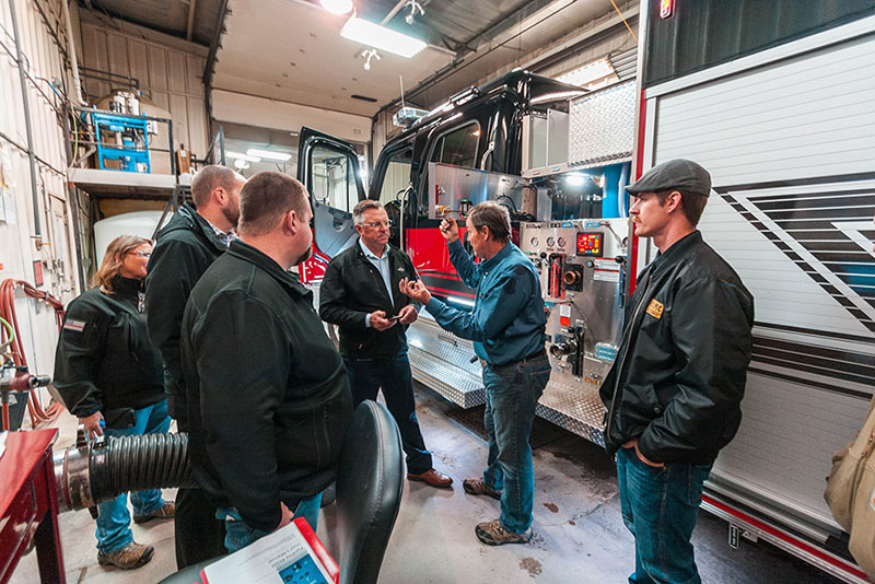 Spartan employees being taught proper maintenance process.