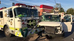 A Prince George&apos;s County, MD, fire apparatus after colliding with a van on Wednesday, Oct. 31, 2018.