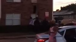 Byron Campbell catches a baby tossed from a third-floor window during an apartment fire in Dallas, TX, on Wednesday, Nov. 21, 2018. Byron Campbell catches a baby tossed from a third-floor window during an apartment fire in Dallas, TX, on Wednesday, Nov. 21, 2018.