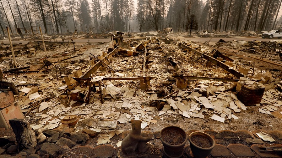 The outlines of mobile homes are all that remain in the Ridgewood Mobile Home Park in Paradise, CA, on Monday, Nov. 12, 2018, after the devastation of the Camp fire.