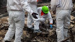 Search and rescue teams inspect the grounds of a house burned down by the Camp Fire in Oroville, CA, on Saturday, Nov. 17, 2018. Search and rescue teams inspect the grounds of a house burned down by the Camp Fire in Oroville, CA, on Saturday, Nov. 17, 2018.