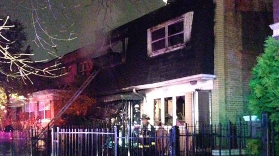 Chicago firefighters on scene during a fire at a duplex in Gresham on the South Side on Friday, Nov. 9, 2018.