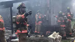 Fairfield firefighters during a mobile home fire in May 2018.