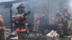 Fairfield firefighters during a mobile home fire in May 2018. Fairfield firefighters during a mobile home fire in May 2018.