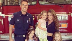 Costa Mesa, CA, fire Capt. Mike Kreza with his wife and three young daughters. Costa Mesa, CA, fire Capt. Mike Kreza with his wife and three young daughters.