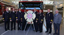 Mobile, AL, fire officials pose for a photo on Tuesday, Nov. 27, 2018, after announcing that the city's Fire-Rescue department has achieved a Class 1 rating from the ISO.