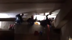 Portland firefighters free a man who got stuck in a 12-inch space between two structures on Wednesday, Nov. 21, 2018.
