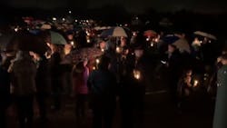 A candlelight vigil is held at Halmstad Elementary School in Chippewa Falls, WI, on Sunday, Nov. 4, 2018 after Girl Scouts and a parent were killed by a pickup driver a day earlier.