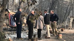 President Donald Trump, second from right, tours the Camp Fire devastation in Paradise, CA, on Saturday, Nov. 17, 2018, with, from left, Gov.-elect Gavin Newsom, Gov. Jerry Brown and Paradise Mayor Jody Jones.