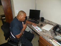 Lego drill: The model boss, stationed in a separate room, gives instructions to the model-makers as to how to construct the set. Lego drill: The model boss, stationed in a separate room, gives instructions to the model-makers as to how to construct the set.