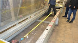 A ratchet unit with 2-inch-wide webbing is placed in a test bed and prepared for the Standard Hand Force test. Photos by Ron Moore A ratchet unit with 2-inch-wide webbing is placed in a test bed and prepared for the Standard Hand Force test. Photos by Ron Moore