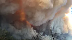 A massive plume of smoke rises from the Camp Fire near Paradise, CA, on Thursday, Nov. 8, 2018.