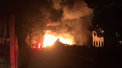 Fairfield firefighters rescued a man after a chicken coop barn fire spread to his home early Tuesday.
