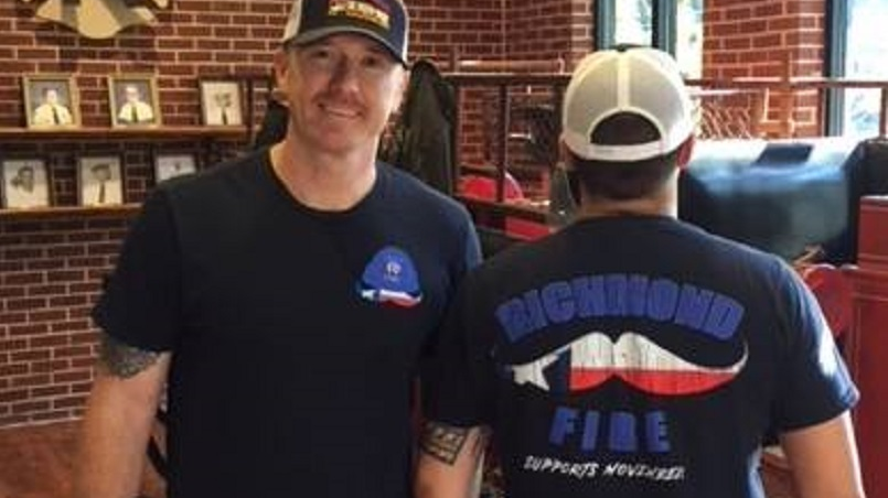 Richmond, TX, firefighters show off the department's T-shirt design for 'Movember' to raise awareness for testicular cancers.