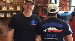 Richmond, TX, firefighters show off the department's T-shirt design for 'Movember' to raise awareness for testicular cancers.