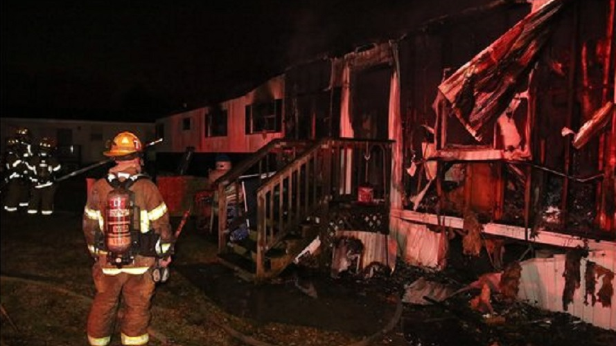 Virginia Beach firefighters on scene after an overnight trailer fire on Tuesday, Dec. 18, 2018.