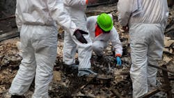 Search and rescue teams inspect the grounds of a house burned down by the Camp Fire in Oroville, CA, on Nov. 17, 2018. Search and rescue teams inspect the grounds of a house burned down by the Camp Fire in Oroville, CA, on Nov. 17, 2018.