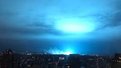 The New York City sky was lit up in blue after a transformer explosion and fire in Queens on Thursday, Dec. 27, 2018. The New York City sky was lit up in blue after a transformer explosion and fire in Queens on Thursday, Dec. 27, 2018.