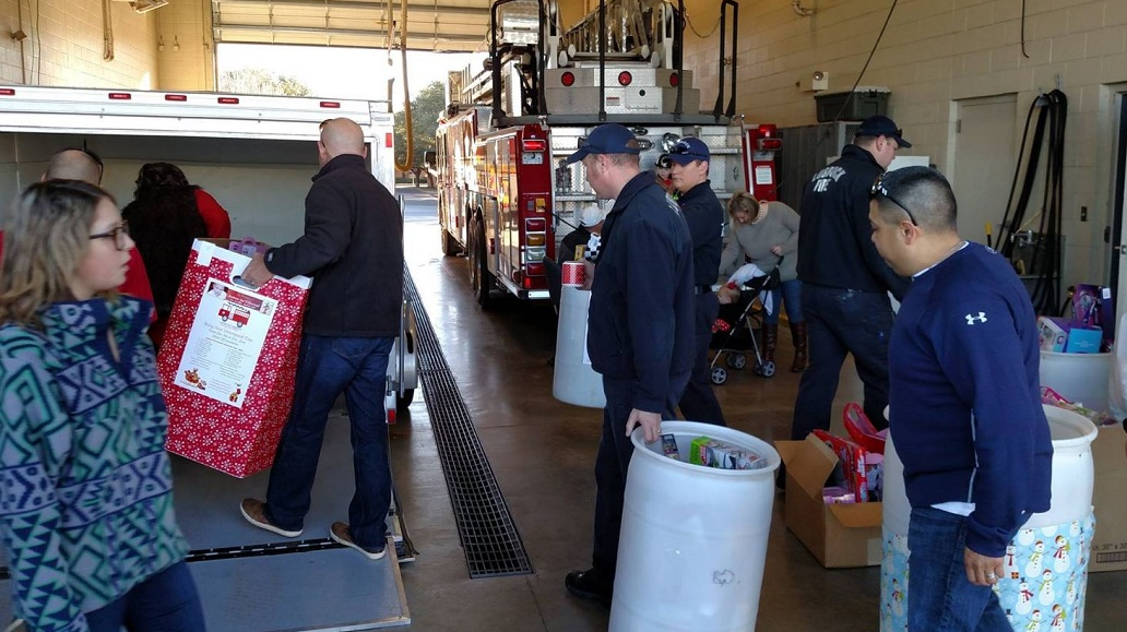 Lubbock firefighters during a Christmas toy drive in 2015.
