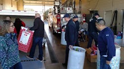 Lubbock firefighters during a Christmas toy drive in 2015. Lubbock firefighters during a Christmas toy drive in 2015.