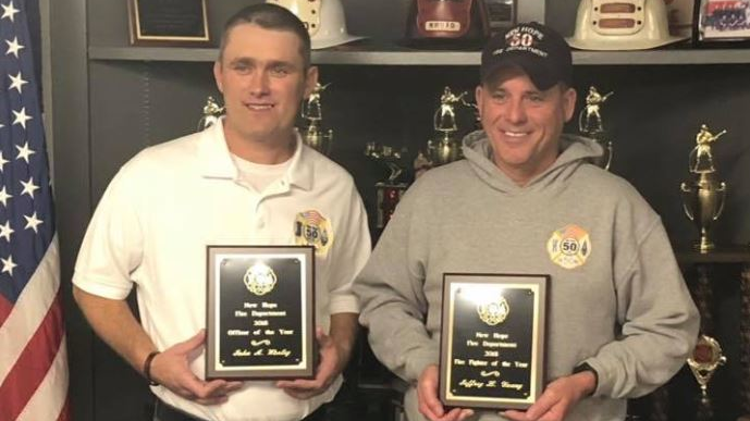 New Hope Assistant Fire Chief John Worley, left, and firefighter Jeff Young after receiving their awards for Officer and Firefighter of the Year.