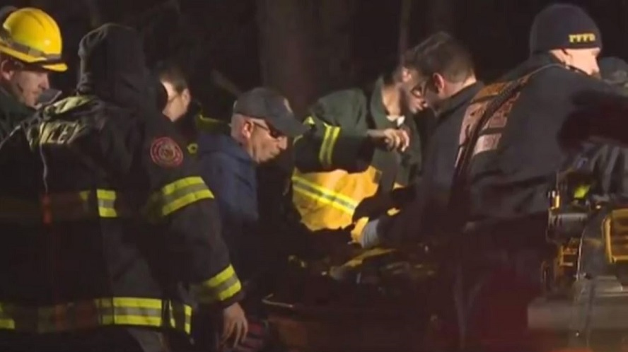 Walden Creek firefighters during the rescue of a man who started a brush fire in Sevier County, TN, on Monday, Dec. 3, 2018 to call for help after being trapped under an ATV for three days.