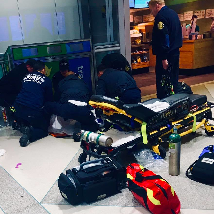A firefighter's mom was returning to her Manchester, NH, home when she helped a man suffering a heart attack in the Philadelphia International Airport.