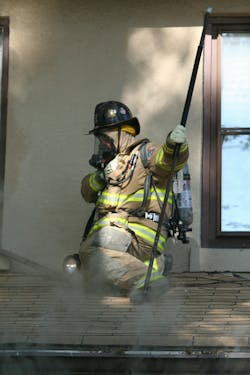 When utilizing an SCBA mask voice port or amplifier to communicate, firefighters should hold the RSM in front of the device and speak in a clear manner.