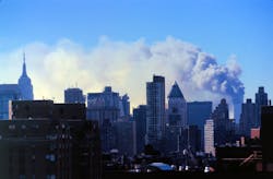 Smoke billows over New York City on September 11, 2001.