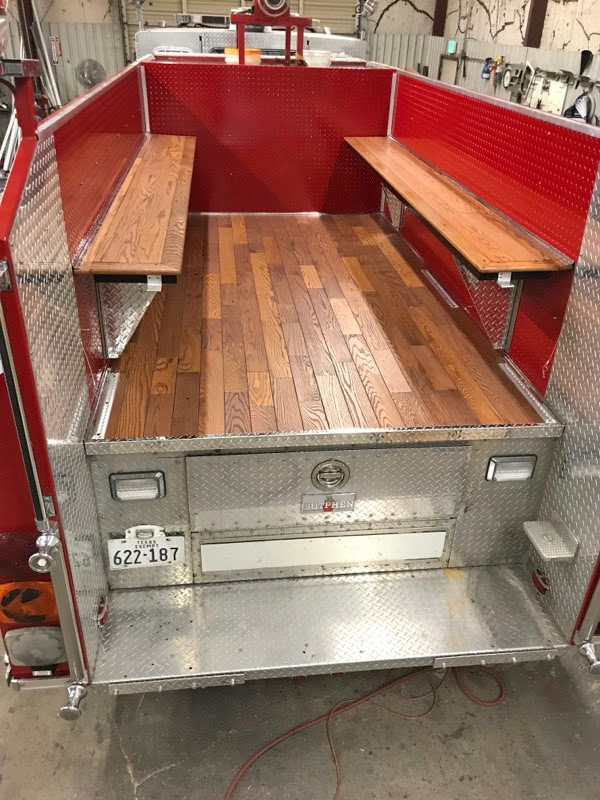 The Warrior has been transformed to serve as a caisson for firefighter funerals and local parades. Fold-up bench seats were added to each side of the rear passenger area.