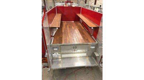 The Warrior has been transformed to serve as a caisson for firefighter funerals and local parades. Fold-up bench seats were added to each side of the rear passenger area.