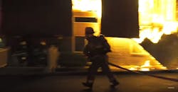 A firefighter deploys a hoseline at the deadly Whitehall Twp. apartment building fire. A firefighter deploys a hoseline at the deadly Whitehall Twp. apartment building fire.