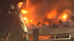 Around 35 firefighters battled a fast-moving fire Thursday that engulfed a McDonald's in Aurora, IL, that had been closed for remodeling.