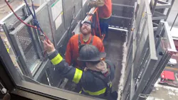 Firefighters rescued two workers who were stuck in a Grand Rapids City Hall elevator six stories up Thursday. Firefighters rescued two workers who were stuck in a Grand Rapids City Hall elevator six stories up Thursday.