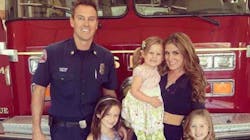 Costa Mesa, CA, fire Capt. Mike Kreza (left) with his wife and three young daughters.