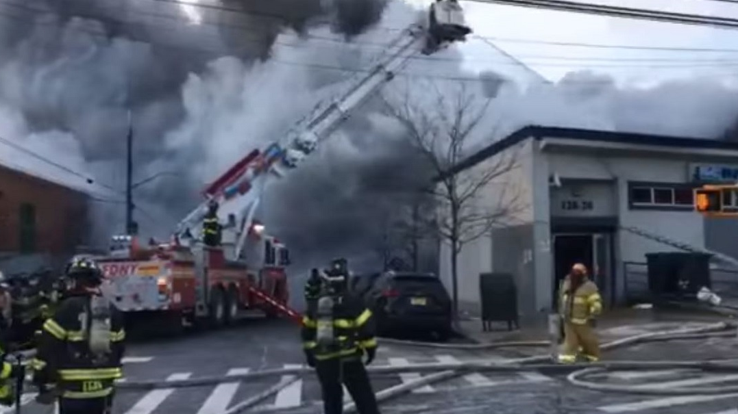More than 100 FDNY firefighters battled frigid temperatures Monday as they worked to put out a fire at a toy and medical supply company in Queens.